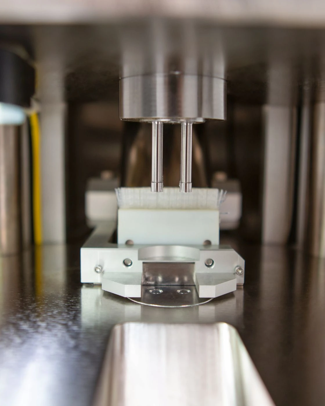 Close up photo of punch on Stokes Model 591 single station tablet press.