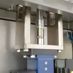 Closeup photo of lower punch on the Stokes Model 591 single station tablet press.
