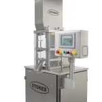 Photo of the Stokes Model 591 single station tablet press.