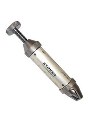 A Stokes tablet hardness tester.