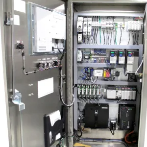 A remanufactured tablet press electrical panel.