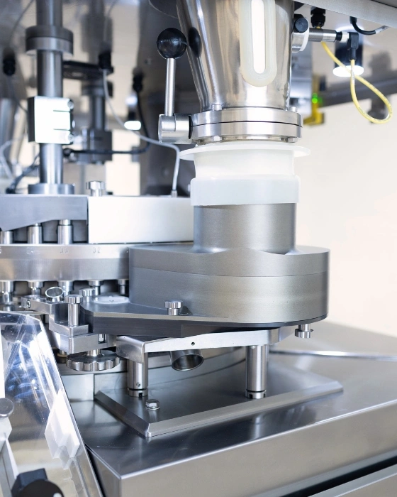 Close up of hopper/feeder area of the Stokes 720 rotary tablet press.